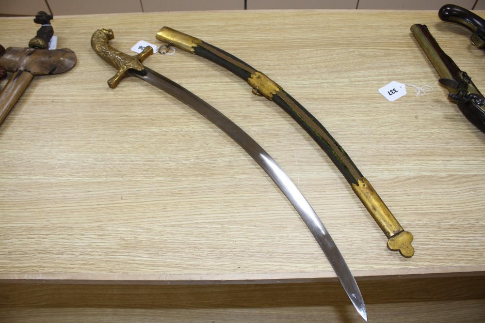 A Hungarian dress sword, 19th century, curved polished blade 60cms,